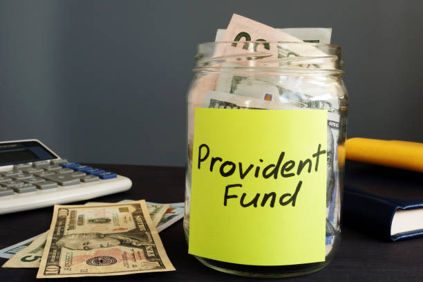 Jar with money and label Provident fund PF.